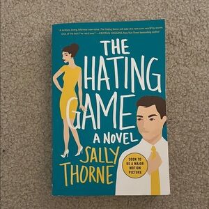 The Hating Game Novel by - Blue Cover